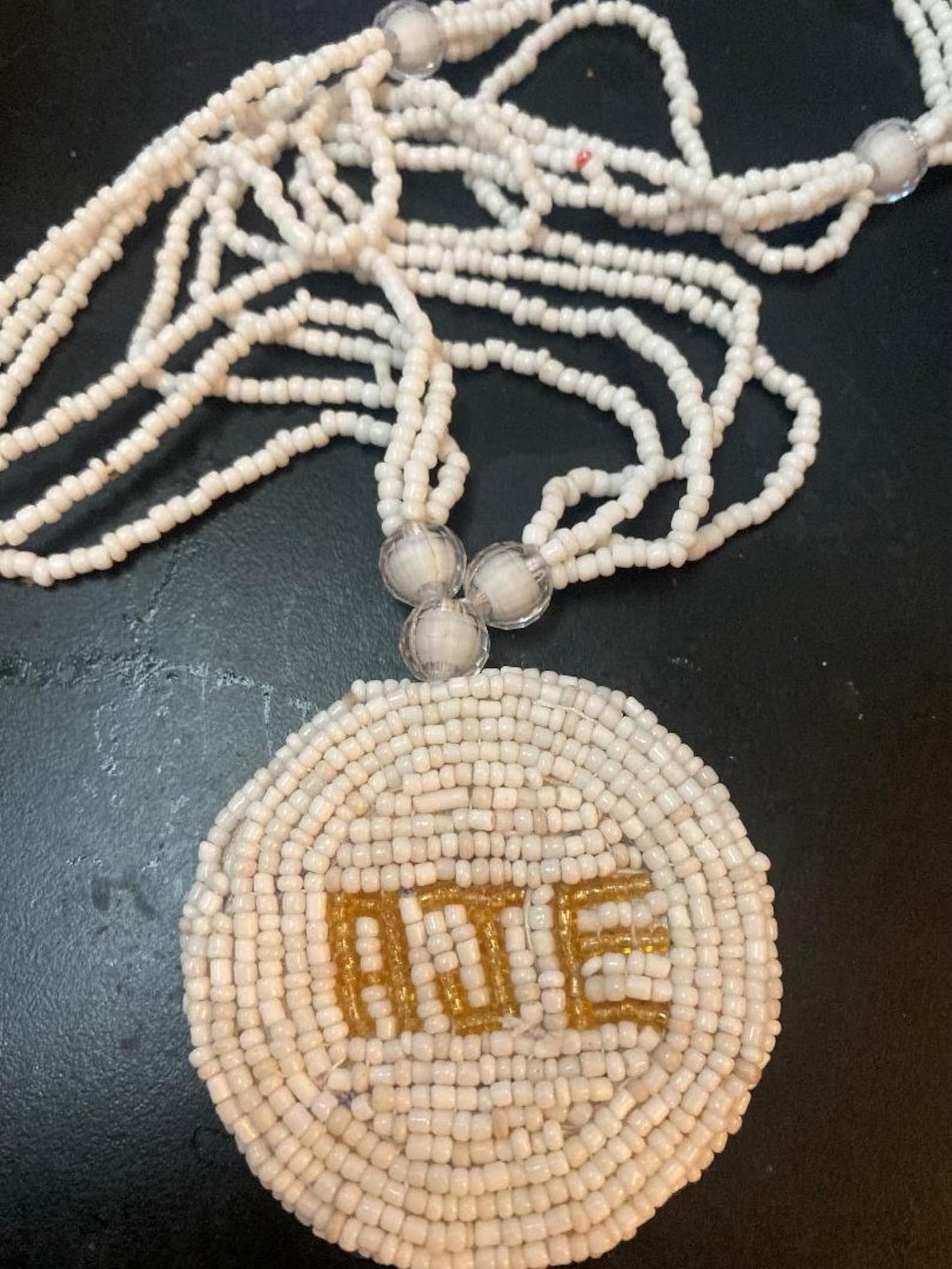 AJE Necklace Black Or Gold Lettering Ileke Eleke With Luxurious White Glass Beads
