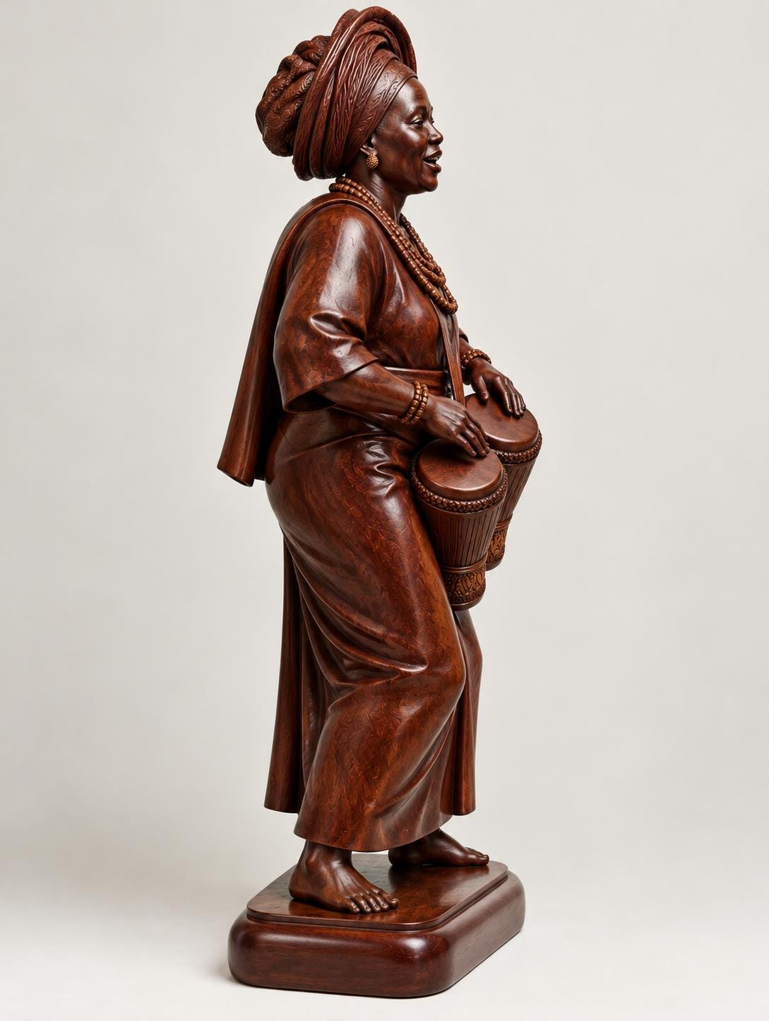 Rare 11 inches Hand Carved Omo wood Yoruba Female Bata Drummer Sculpture